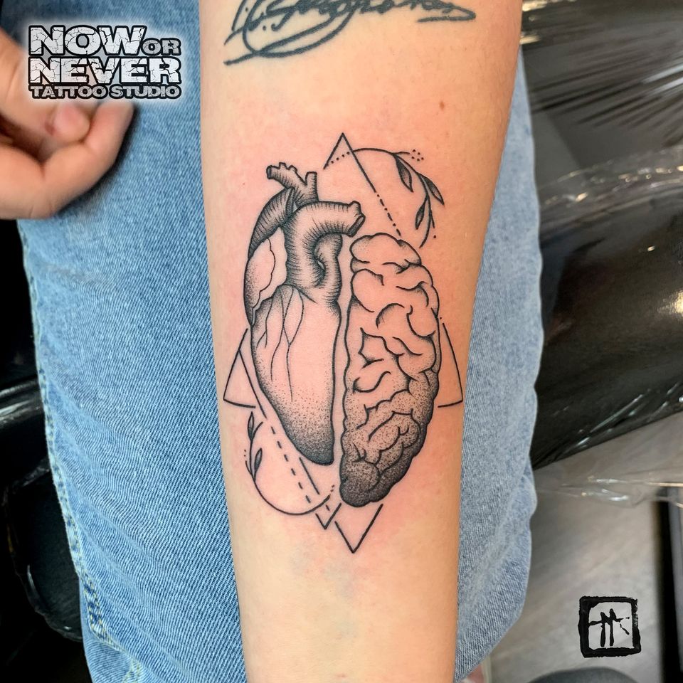 geometrical heart tattoo done at Now or Never Tattoo Studio Barcelona